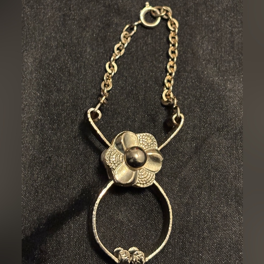 Vintage brass or Gold tone Glove or scarf clip with chain & clasp
